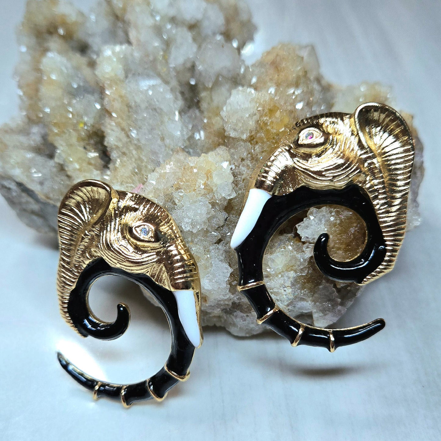 Unique Elephant spiral trunk tusk diamond eye earrings
