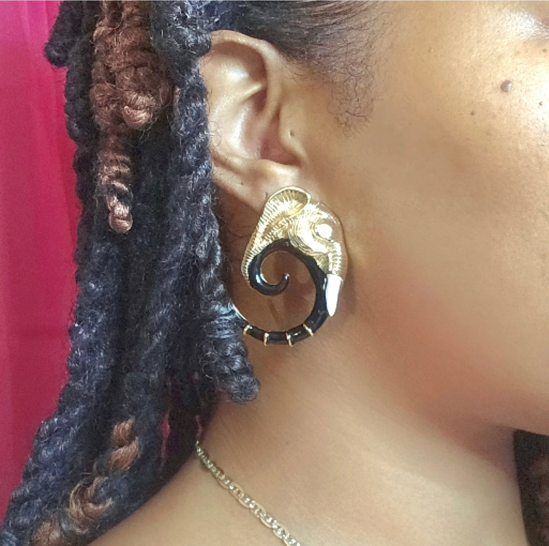 Unique Elephant spiral trunk tusk diamond eye earrings