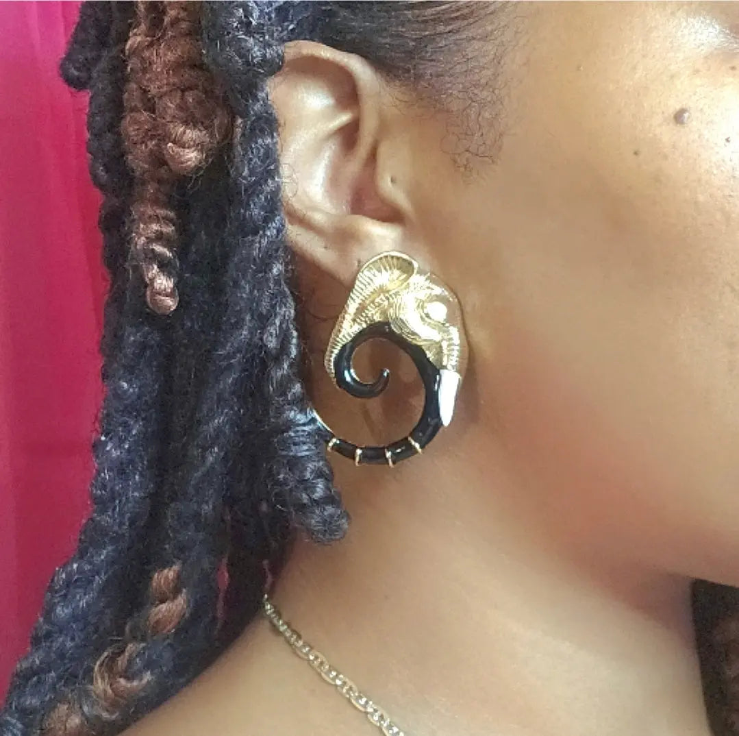 Unique Elephant spiral trunk tusk diamond eye earrings