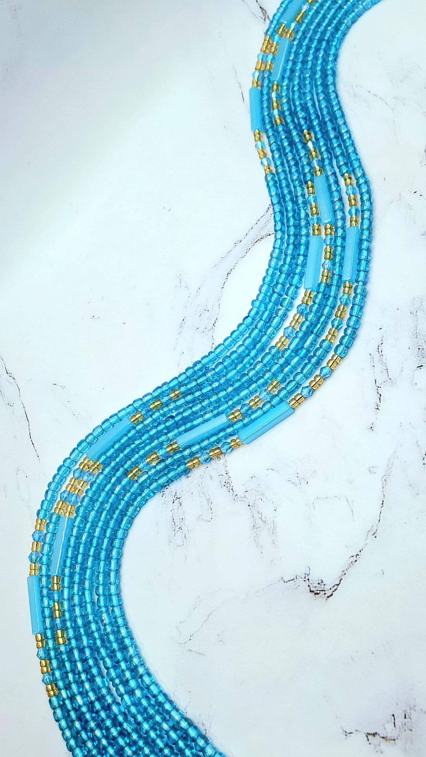 Translucent blue tie on waist beads