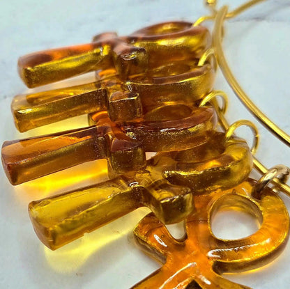 Ankh Life  bold gold amber honey large charm spiritual intention wire latch bracelet close up