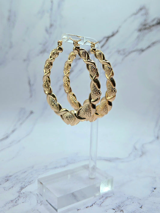 Gold Hearts and Hugs 90s XOXO bamboo hoop earrings medium size